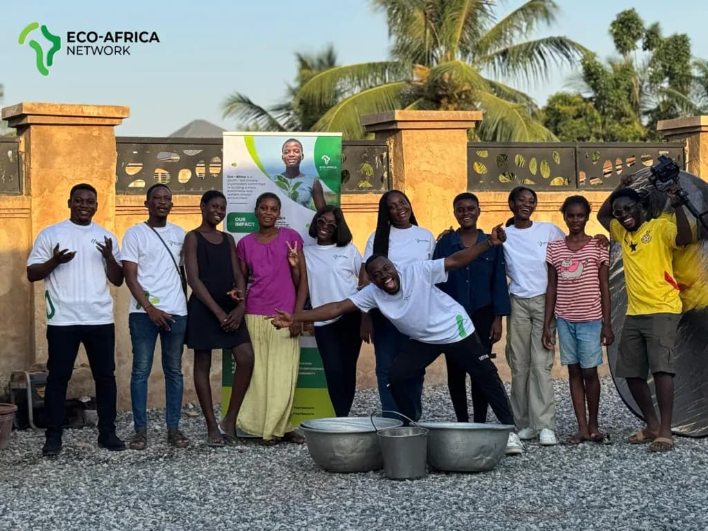 Eco-Africa Network team and community members after an outreach activity
